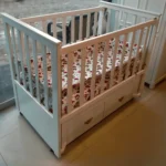 Classic White Wooden Baby Crib with Storage & Sliding Side